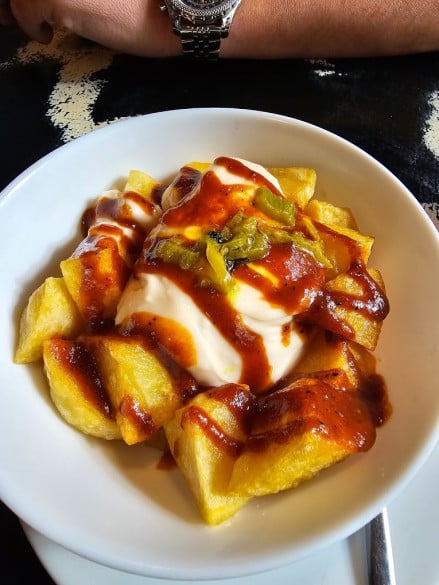 Patatas bravas and vermut